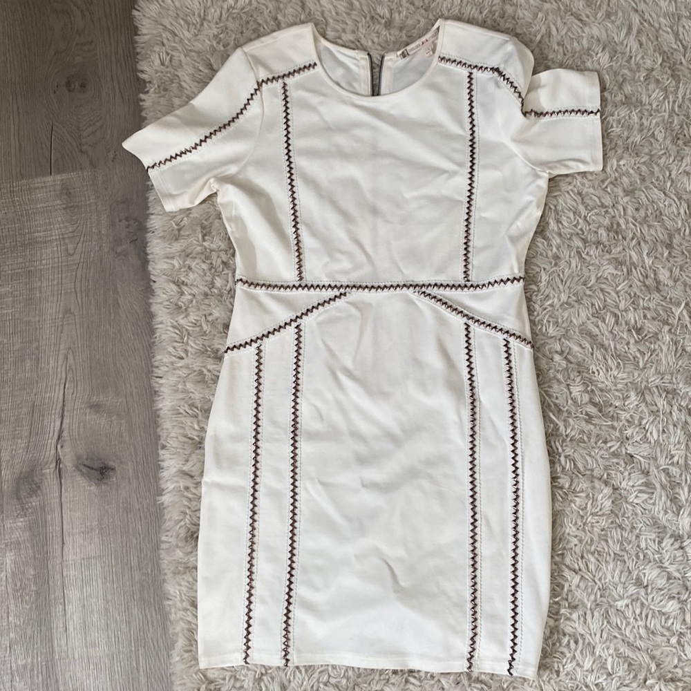 White dress with gold studs
